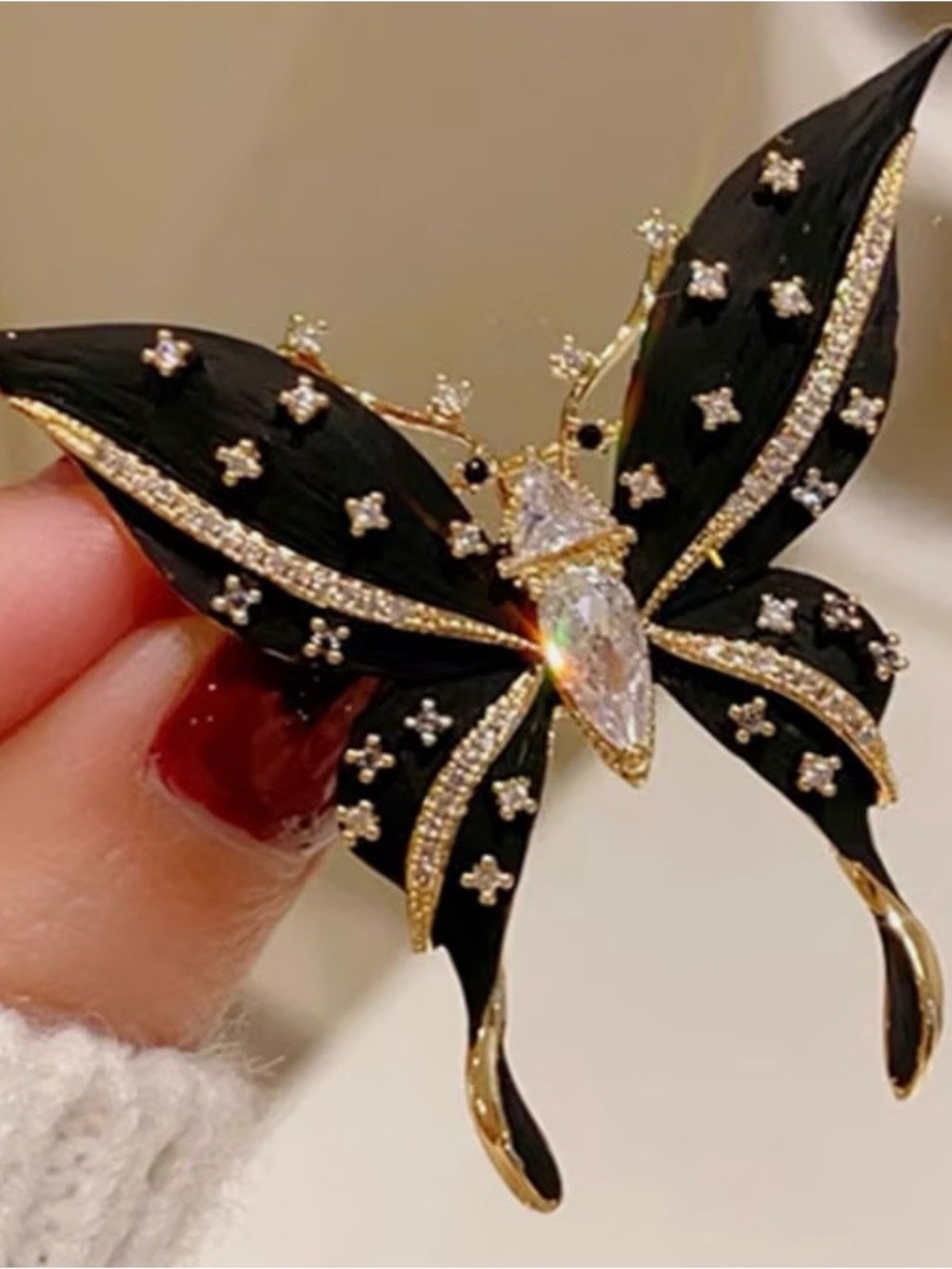 Elegant Black & Gold Butterfly Brooch with Crystal Accent - Picture 2 of 3